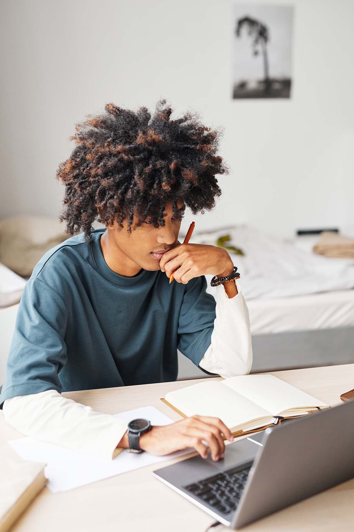 Student studying online with CAC